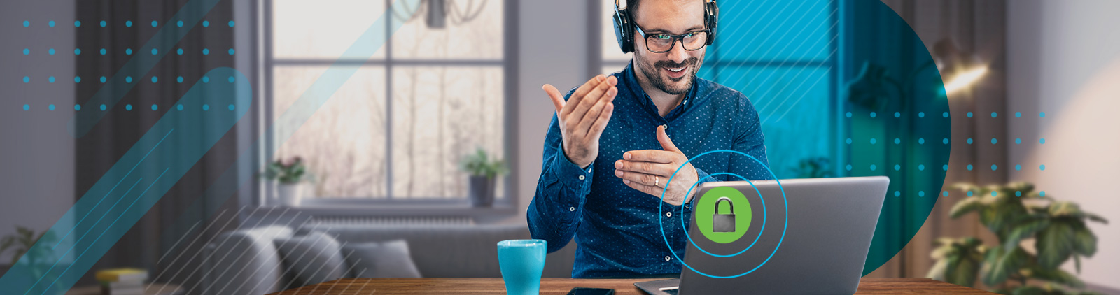 Man wearing headphones and smiling at laptop